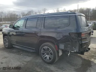 2023 Jeep Wagoneer with VIN 1C4SJVAPXPS562369, listed as a Copart auction lot 50512015 with 18,760 mi miles and Salvage Title. Bid and sale history available at carsss.com. Image 2.