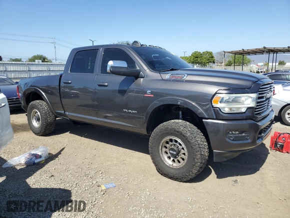2020 Ram 2500 Laramie with VIN 3C6UR5FL8LG200525, listed as a Copart auction lot 56985625 with 59,151 mi miles and Salvage title. Bid and sale history available at DreamBid. Image 4.