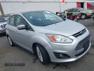 2014 Ford C-Max SEL z VIN 1FADP5BU7EL511677, wystawiony jako IAAI lot #40554962 z przebiegiem 63 031 mil mil oraz . Historia ofert i sprzedaży dostępna na DreamBid. Obrazek 1.