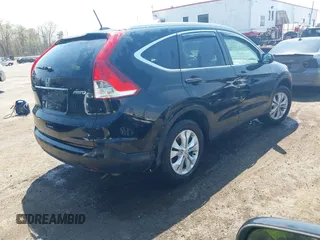 2014 Honda CR-V EX-L with VIN 2HKRM4H76EH673891, listed as a IAAI auction lot 42009693 with 103,798 mi miles. Bid and sale history available at carsss.com. Image 4.