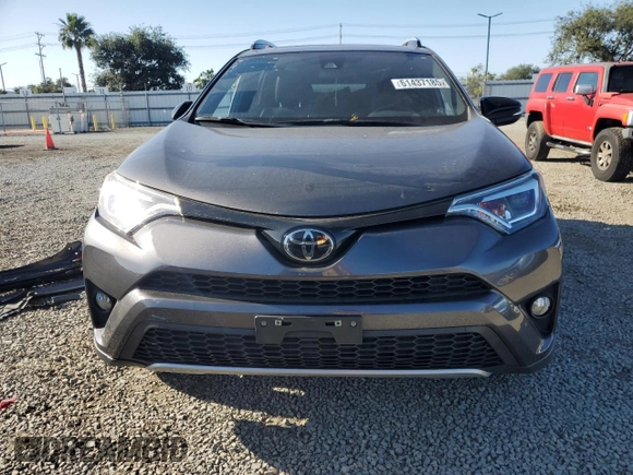 2017 Toyota RAV4 SE with VIN JTMNFREV0HJ706274, listed as a Copart auction lot 61437185 with 93,478 mi miles and Salvage title. Bid and sale history available at DreamBid. Image 5.