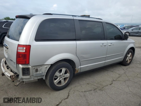 2009 Dodge Grand Caravan SE z VIN 2D8HN44E29R591969, wystawiony jako Copart lot #64255535 z przebiegiem 154 214 mil mil oraz Szkoda całkowita • Salvage title. Historia ofert i sprzedaży dostępna na DreamBid. Obrazek 3.