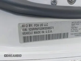 2021 Ram 1500 Tradesman with VIN 1C6RR6FG0MS598371, listed as a IAAI auction lot 42153876 with 69,620 mi miles and . Bid and sale history available at DreamBid. Image 9.