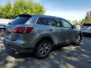 2014 Mazda CX-9 Touring z VIN JM3TB3CV4E0438423, wystawiony jako Copart lot #58603325 z przebiegiem 81 177 mil mil oraz Czysty tytuł • Clean title. Historia ofert i sprzedaży dostępna na DreamBid. Obrazek 3.