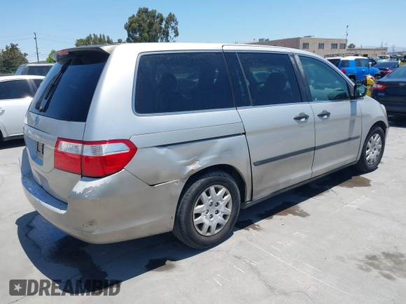 2007 Honda Odyssey LX z VIN 5FNRL38217B016001, wystawiony jako IAAI lot #42603816 z przebiegiem 209 630 mil mil oraz . Historia ofert i sprzedaży dostępna na DreamBid. Obrazek 4.
