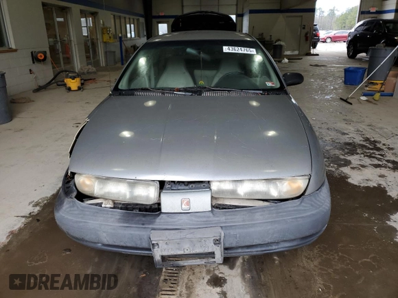 1998 Saturn SL with VIN 1G8ZF5285WZ204569, listed as a Copart auction lot 43624765 with 318,544 mi miles and Salvage Title. Bid and sale history available at carsss.com. Image 5.