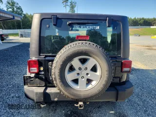 2012 Jeep Wrangler Sport with VIN 1C4AJWAG5CL273292, listed as a Copart auction lot 60135395 with 123,874 mi miles and Salvage title. Bid and sale history available at DreamBid. Image 6.