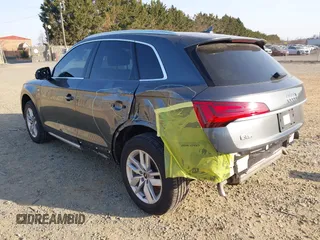 2022 Audi Q5 S line Premium z VIN WA1GAAFY0N2140330, wystawiony jako IAAI lot #41756318 z przebiegiem 39 165 mil mil oraz . Historia ofert i sprzedaży dostępna na DreamBid. Obrazek 3.
