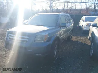 2008 Honda Pilot EX-L with VIN 5FNYF18588B030741, listed as a IAAI auction lot 41368390 with 999,999 mi miles. Bid and sale history available at carsss.com. Image 2.