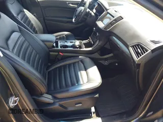 2019 Ford Edge SEL with VIN 2FMPK4J91KBC13436, listed as a IAAI auction lot 42551782 with 77,164 mi miles and . Bid and sale history available at DreamBid. Image 5.