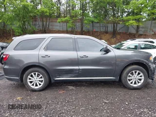 2015 Dodge Durango SXT with VIN 1C4RDJAG6FC177561, listed as a IAAI auction lot 42314437 with 104,898 mi miles and . Bid and sale history available at DreamBid. Image 13.