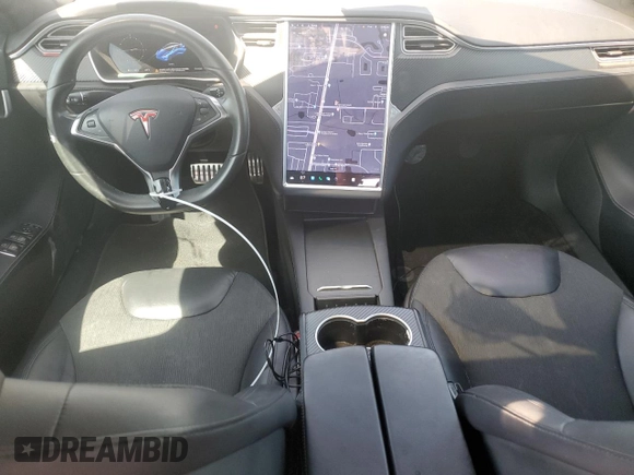 2016 Tesla Model S 90D with VIN 5YJSA1E27GF171698, listed as a Copart auction lot 49176205 with 107,913 mi miles and Salvage Title. Bid and sale history available at DreamBid. Image 8.