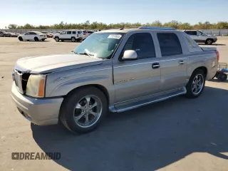 2004 Cadillac Escalade EXT z VIN 3GYEK62N24G181478, wystawiony jako Copart lot #77374604 z przebiegiem 157 594 mil mil oraz Szkody całkowita. Historia ofert i sprzedaży dostępna na DreamBid. Obrazek 1.