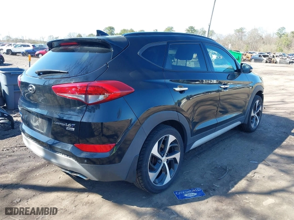 2018 Hyundai Tucson Value with VIN KM8J3CA26JU713729, listed as a IAAI auction lot 41950946 with 73,456 mi miles. Bid and sale history available at carsss.com. Image 4.