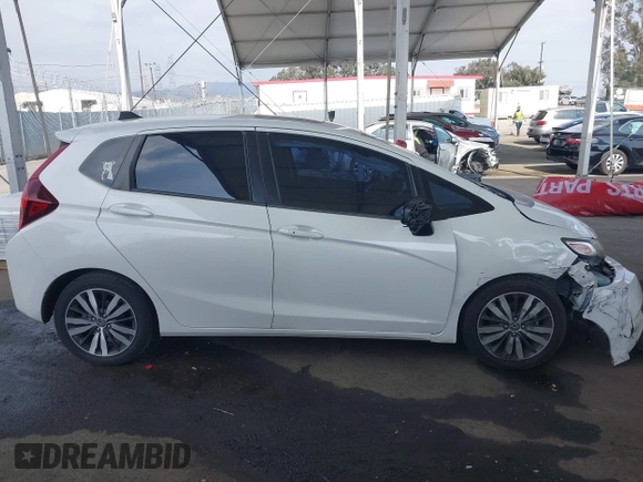 2016 Honda Fit EX with VIN JHMGK5H71GX042913, listed as a IAAI auction lot 42078814 with 94,824 mi miles and . Bid and sale history available at DreamBid. Image 13.