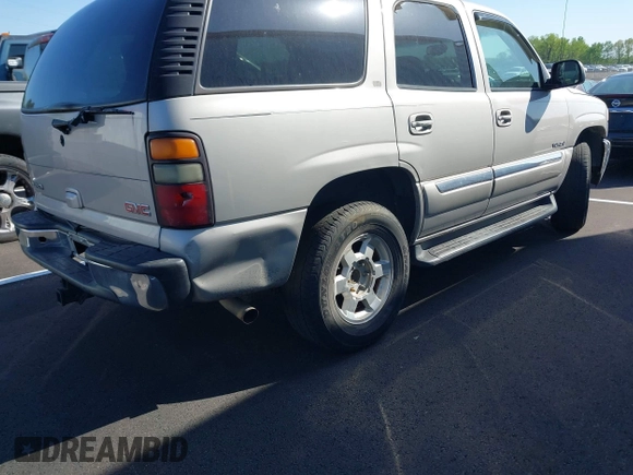 2004 GMC Yukon SLT with VIN 1GKEK13Z14J173689, listed as a IAAI auction lot 41979936 with 1 mi miles. Bid and sale history available at carsss.com. Image 4.