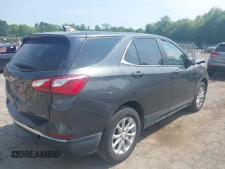 2021 Chevrolet Equinox LT with VIN 3GNAXUEV3ML379622, listed as a IAAI auction lot 42494950 with 73,382 mi miles and . Bid and sale history available at DreamBid. Image 4.