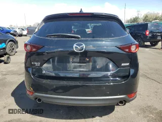 2018 Mazda CX-5 Touring with VIN JM3KFBCM4J0466234, listed as a Copart auction lot 51617095 with 58,200 mi miles and Salvage Title. Bid and sale history available at carsss.com. Image 6.
