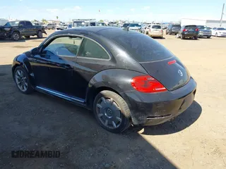 2013 Volkswagen Beetle 2.5L with VIN 3VWJP7ATXDM679115, listed as a IAAI auction lot 42212965 with Not Provided miles and . Bid and sale history available at DreamBid. Image 3.