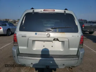 2005 Mercury Mariner Luxury z VIN 4M2CU57125DJ16694, wystawiony jako Copart lot #69063704 z przebiegiem 222 793 mil mil oraz Szkody całkowita. Historia ofert i sprzedaży dostępna na DreamBid. Obrazek 6.