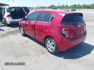 2016 Chevrolet Sonic LT with VIN 1G1JC6SH7G4127373, listed as a IAAI auction lot 41970423 with 130,440 mi miles. Bid and sale history available at carsss.com. Image 3.