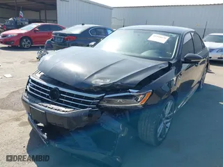 2018 Volkswagen Passat 2.0T S with VIN 1VWAA7A34JC025600, listed as a IAAI auction lot 41594079 with 92,019 mi miles. Bid and sale history available at carsss.com. Image 6.