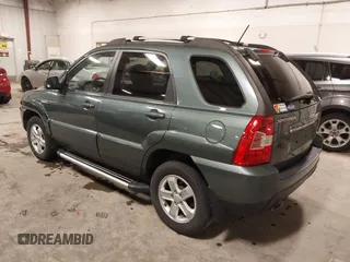 2009 Kia Sportage LX with VIN KNDJE723097558182, listed as a IAAI auction lot 41295142 with 147,200 mi miles. Bid and sale history available at carsss.com. Image 3.