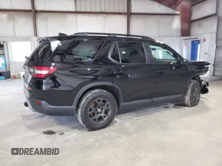 2023 Honda Pilot TrailSport with VIN 5FNYG1H63PB031249, listed as a Copart auction lot 85163934 with 12,058 mi miles and Salvage Title. Bid and sale history available at carsss.com. Image 3.