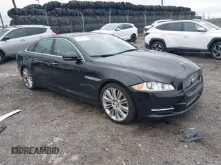 2015 Jaguar XJ Portfolio with VIN SAJWJ2GD9F8V90173, listed as a IAAI auction lot 42445628 with 93,225 mi miles and . Bid and sale history available at DreamBid. Image 1.