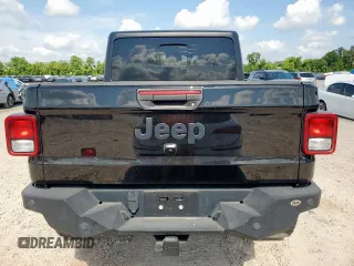 2021 Jeep Gladiator Freedom with VIN 1C6HJTAG8ML580882, listed as a Copart auction lot 57690885 with Not provided miles and Salvage title. Bid and sale history available at DreamBid. Image 6.