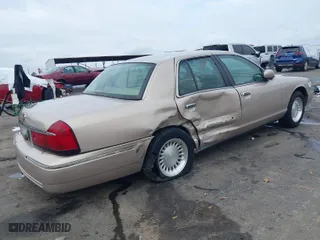 1998 Mercury Grand Marquis LS with VIN 2MEFM75W2WX695255, listed as a IAAI auction lot 41481865 with 177,365 mi miles. Bid and sale history available at carsss.com. Image 4.