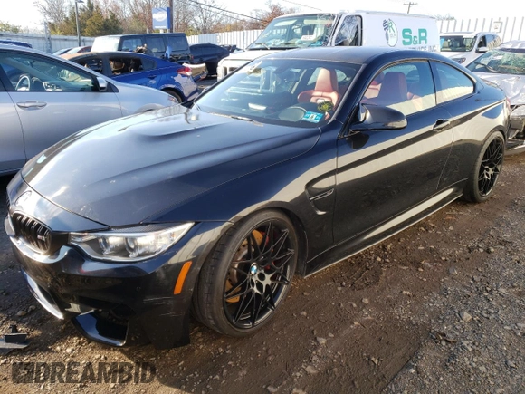 2015 BMW M4 with VIN WBS3R9C5XFK335304, listed as a Copart auction lot 69406962 with 0 mi miles. Bid and sale history available at carsss.com. Image 1.