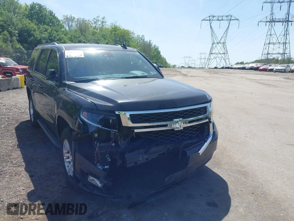 2020 Chevrolet Tahoe LT with VIN 1GNSKBKCXLR255963, listed as a IAAI auction lot 42127845 with 46,746 mi miles and . Bid and sale history available at DreamBid. Image 6.