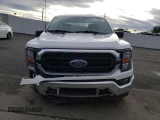 2023 Ford F-150 XL z VIN 1FTEW1EP1PKE10563, wystawiony jako Copart lot #50808675 z przebiegiem 30 670 mil mil oraz Szkoda całkowita • Salvage title. Historia ofert i sprzedaży dostępna na DreamBid. Obrazek 5.
