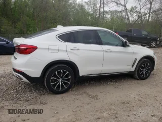 2015 BMW X6 xDrive35i z VIN 5UXKU2C58F0N77172, wystawiony jako Copart lot #55631415 z przebiegiem 246 622 mil mil oraz Tytuł czysty. Historia ofert i sprzedaży dostępna na DreamBid. Obrazek 3.
