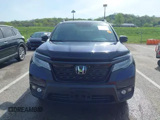 2020 Honda Passport Touring z VIN 5FNYF8H94LB015299, wystawiony jako IAAI lot #42064416 z przebiegiem 62 397 mil mil oraz . Historia ofert i sprzedaży dostępna na DreamBid. Obrazek 12.