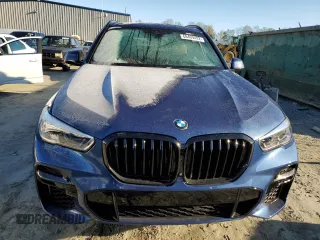 2022 BMW X5 xDrive40i with VIN 5UXCR6C08N9M97933, listed as a Copart auction lot 68409492 with 9,945 mi miles. Bid and sale history available at carsss.com. Image 5.