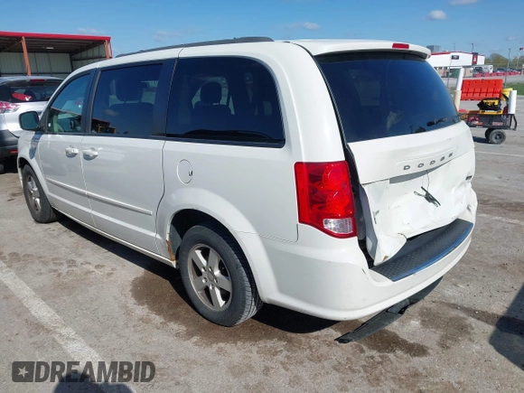2013 Dodge Grand Caravan SXT with VIN 2C4RDGCG2DR522136, listed as a IAAI auction lot 42023561 with 176,635 mi miles and . Bid and sale history available at DreamBid. Image 3.