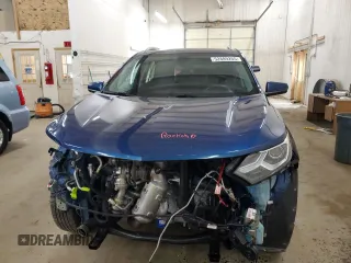 2020 Chevrolet Equinox LT z VIN 3GNAXVEX5LL196583, wystawiony jako Copart lot #52889265 z przebiegiem 145 999 mil mil oraz Szkoda całkowita • Salvage title. Historia ofert i sprzedaży dostępna na DreamBid. Obrazek 5.