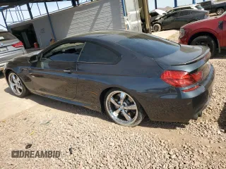 2016 BMW M6 z VIN WBS6J9C51GD934487, wystawiony jako Copart lot #45756775 z przebiegiem 62 179 mil mil oraz Szkoda całkowita • Salvage title. Historia ofert i sprzedaży dostępna na DreamBid. Obrazek 2.