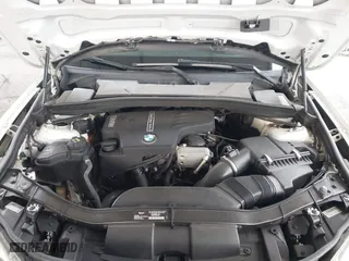 2015 BMW X1 sDrive28i with VIN WBAVM1C53FV318663, listed as a IAAI auction lot 41711526 with 182,204 mi miles. Bid and sale history available at carsss.com. Image 10.