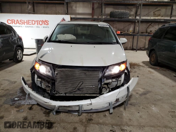 2014 Honda Odyssey Touring with VIN 5FNRL5H90EB137575, listed as a Copart auction lot 54606535 with 168,714 mi miles and Salvage title. Bid and sale history available at DreamBid. Image 5.