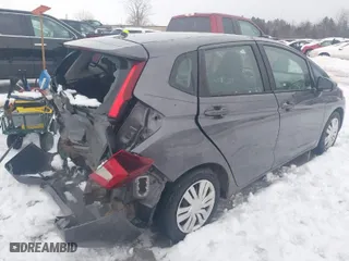 2015 Honda Fit LX with VIN 3HGGK5H53FM760016, listed as a IAAI auction lot 41447554 with 141,521 mi miles. Bid and sale history available at carsss.com. Image 4.