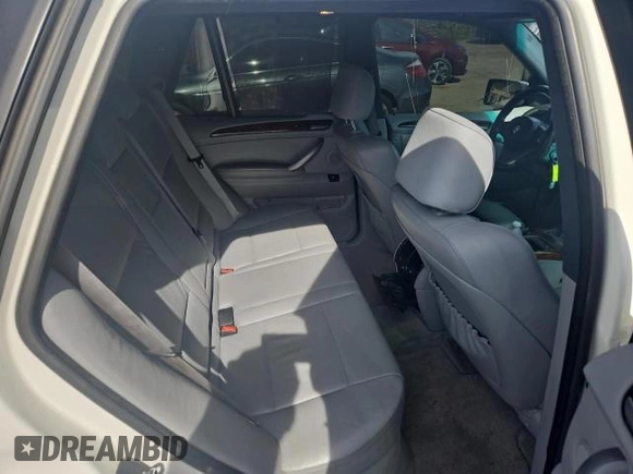 2006 BMW X5 4.4i with VIN 5UXFB53556LV26283, listed as a Copart auction lot 79714584 with 77,033 mi miles and Clean Title. Bid and sale history available at carsss.com. Image 6.