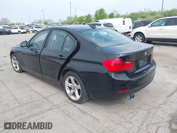 2015 BMW 3 Series 328i with VIN WBA3A5G57FNS87368, listed as a IAAI auction lot 42132939 with 115,289 mi miles. Bid and sale history available at carsss.com. Image 3.