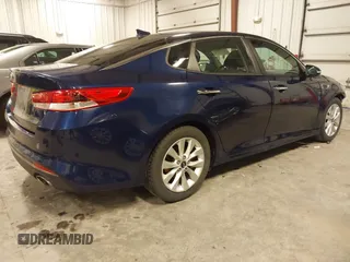 2016 Kia Optima LX with VIN 5XXGT4L34GG002569, listed as a IAAI auction lot 41732810 with 148,044 mi miles. Bid and sale history available at carsss.com. Image 4.