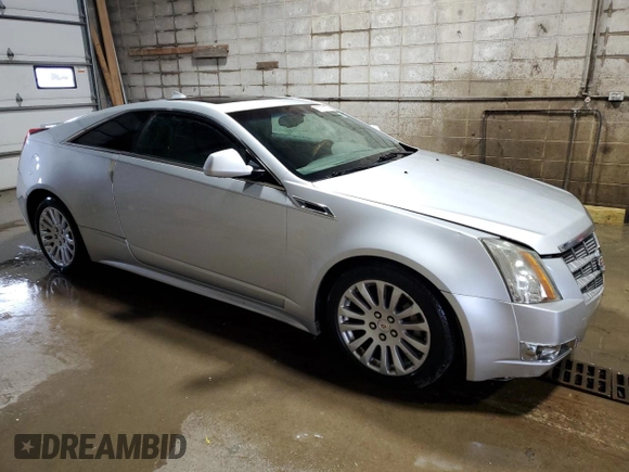 2011 Cadillac CTS Premium with VIN 1G6DS1ED3B0102752, listed as a Copart auction lot 57709275 with 152,957 mi miles and Clean title. Bid and sale history available at DreamBid. Image 4.