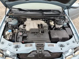 2004 Jaguar X-Type with VIN SAJEA51C04WD73149, listed as a Copart auction lot 74020364 with 118,034 mi miles and Salvage Title. Bid and sale history available at carsss.com. Image 11.