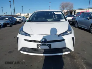 2021 Toyota Prius L Eco with VIN JTDKAMFU0M3149875, listed as a IAAI auction lot 41966010 with 99,542 mi miles. Bid and sale history available at carsss.com. Image 13.