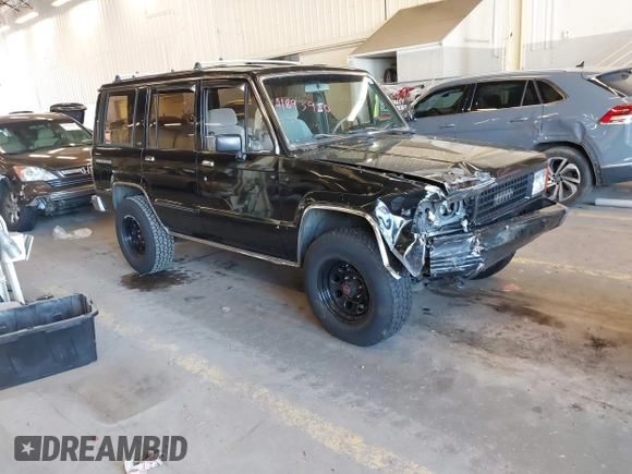1991 Isuzu Trooper z VIN JACCH58R8M7902476, wystawiony jako IAAI lot #41893980 z przebiegiem 169 269 mil mil oraz . Historia ofert i sprzedaży dostępna na DreamBid. Obrazek 1.